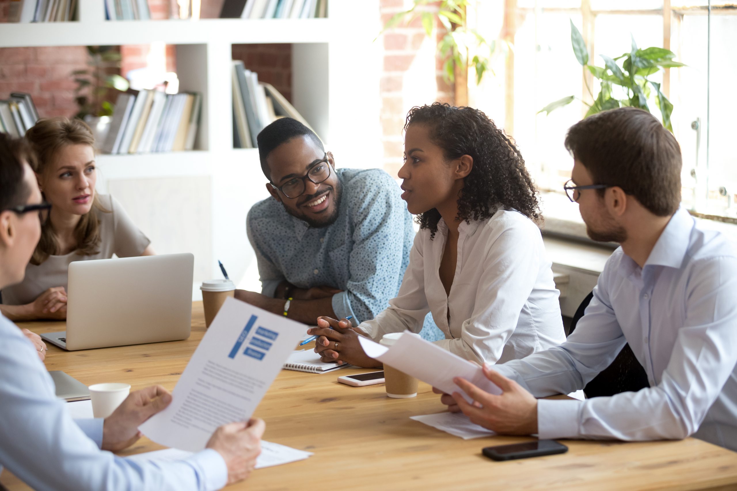 Consulting team reviewing strategy in a boardroom